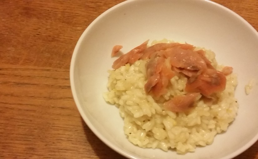 A photograph of Lemon Risotto with Smoked Salmon in a white bowl